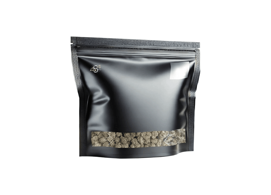 Black CurePak pouch with clear window showing cannabis