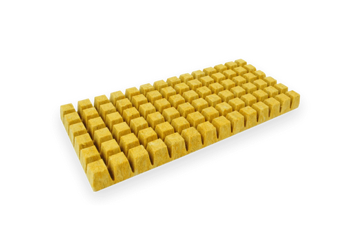 Sheet of yellow Cultiwool rockwool rooting plugs with planting holes
