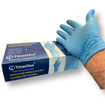 Hand resting over Titanfine Nitrile Cannabis Trimming Gloves