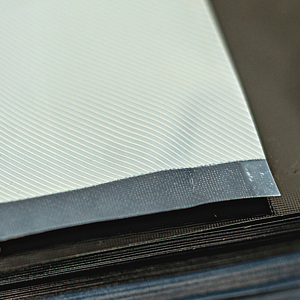 Close-up of 454 Bags' bioplastic vacuum bag, highlighting resealable and durable edges.