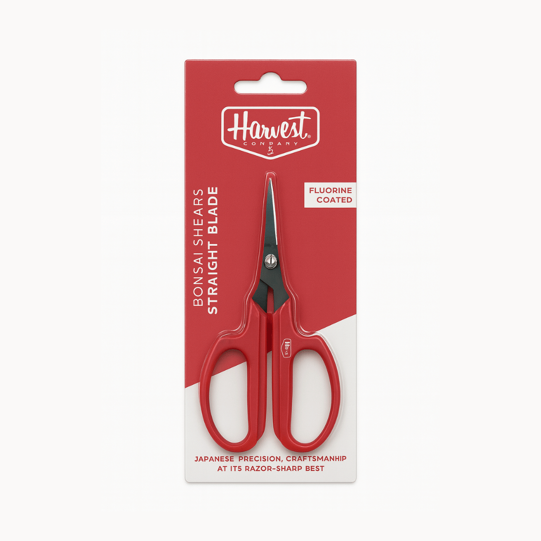 Red bonsai shears with black handles in packaging on a white background