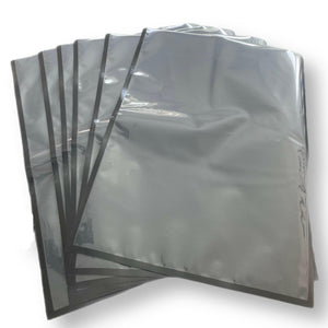 Close-up of the 454 Vacuum Bags, showcasing the clear and black sides of the 5 mil thick bags. Designed with a strong seal and puncture resistance for optimal cannabis storage and protection.