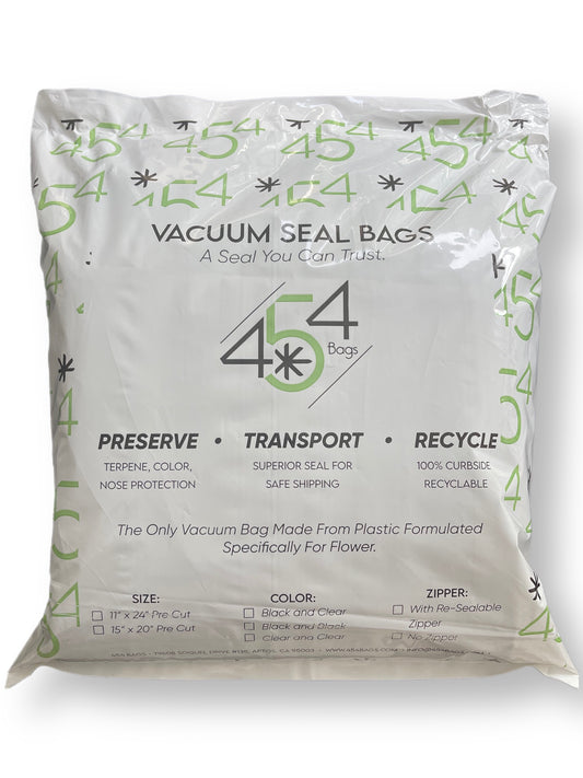 Close-up of a 454 Vacuum Bag's proprietary plastic texture, emphasizing its strength and quality. One side is black, and the other is clear, demonstrating its dual-tone design