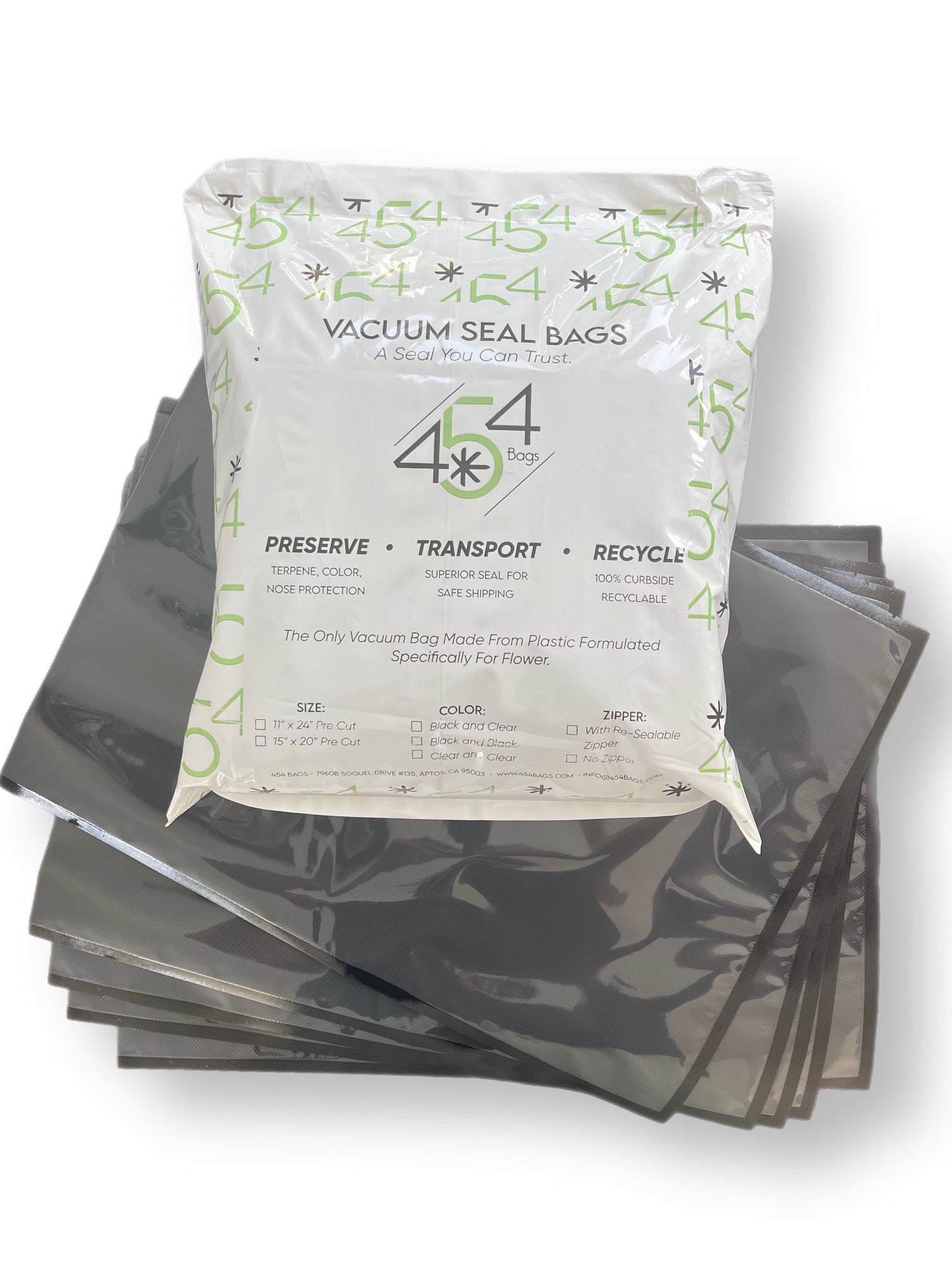 Packaging displaying the 454 Vacuum Bags alongside the actual bags. These 15"x20" bags, designed especially for cannabis, have a clear side for easy content visibility and a black side for discretion.
